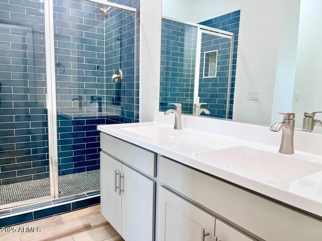 3434 North Longview Avenue, Unit 13 Phoenix, AZ 85014 - Photo 23 of 53 a bathroom with a sink and a shower