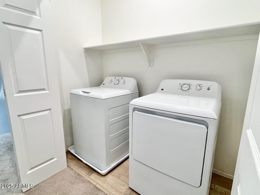3434 North Longview Avenue, Unit 13 Phoenix, AZ 85014 - Photo 27 of 53 a utility room with dryer and washer