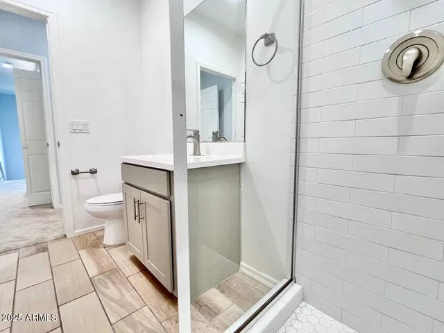 a bathroom with a sink and a toilet