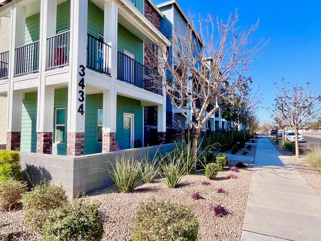 a view of a house with a street