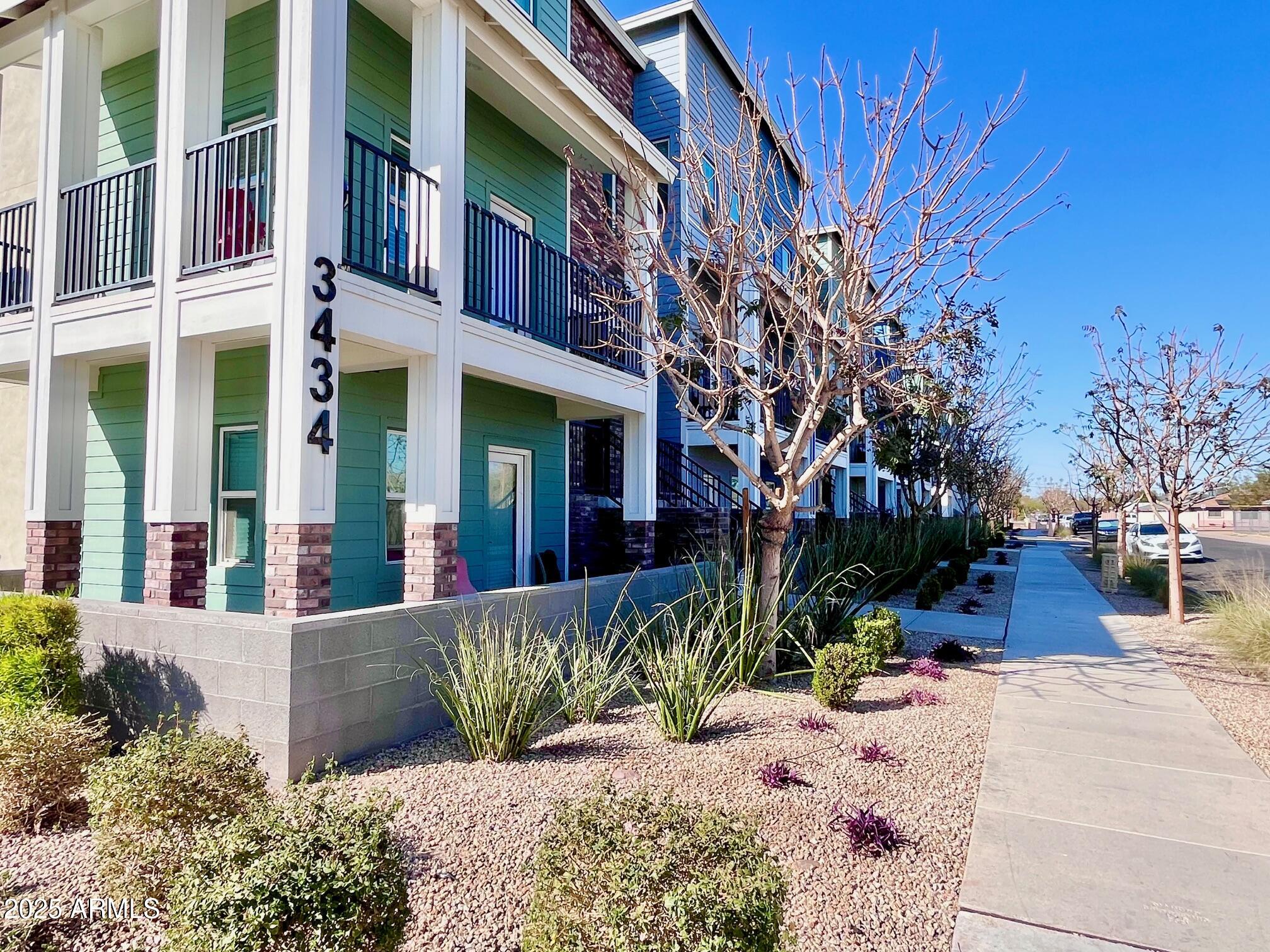 3434 North Longview Avenue, Unit 13 Phoenix, AZ 85014 - Photo 48 of 53 a view of a building with a trees