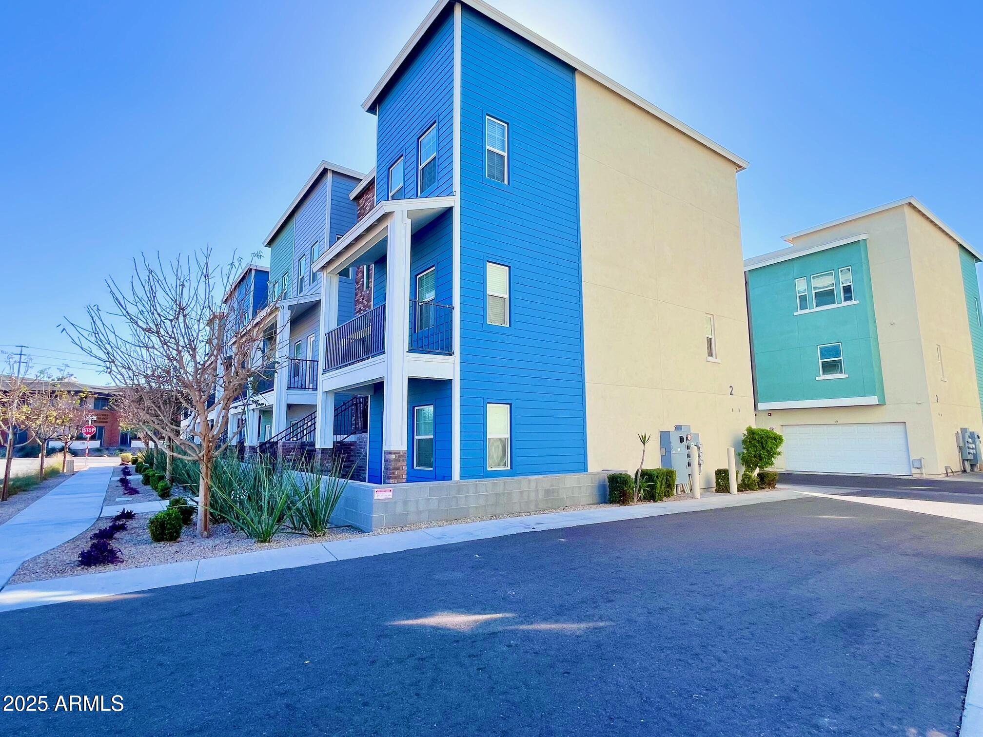 3434 North Longview Avenue, Unit 13 Phoenix, AZ 85014 - Photo 51 of 53 a view of a house with a street