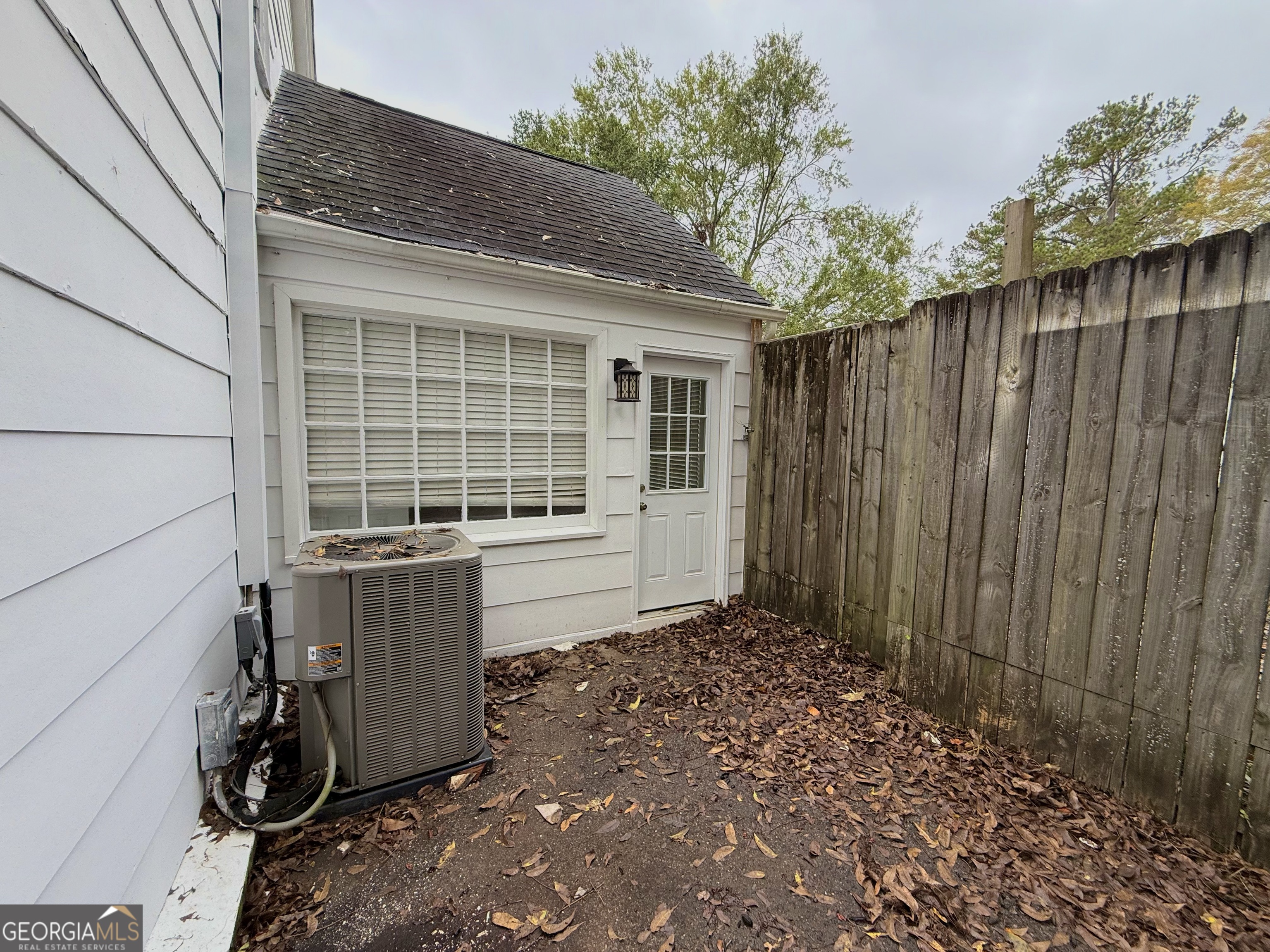 209 Mimosa Drive Dublin, GA 31021 - Photo 12 of 68 a view of a house with a backyard