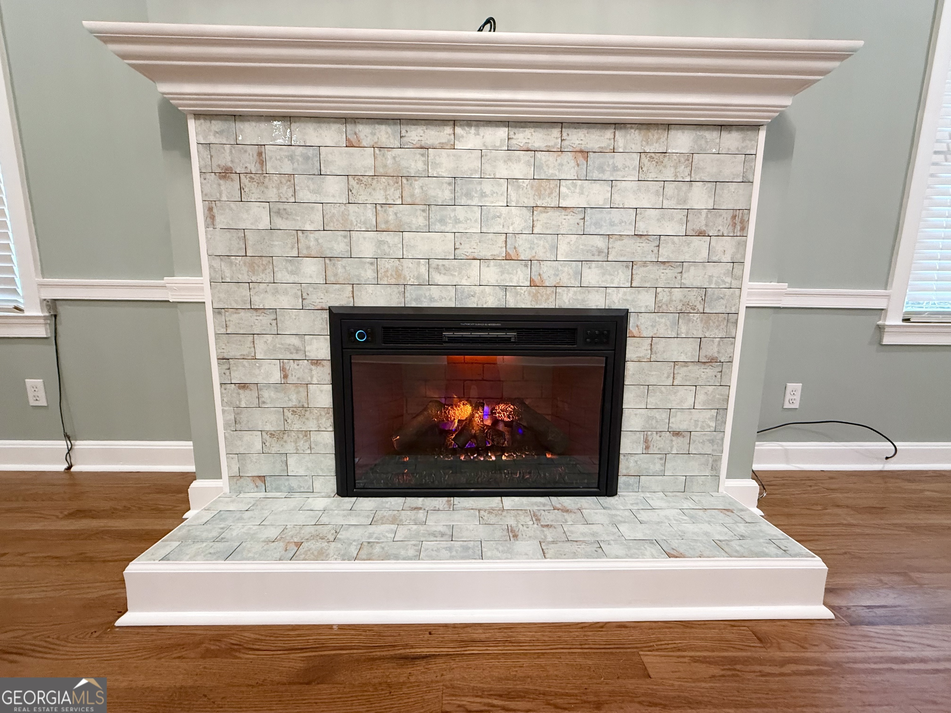 209 Mimosa Drive Dublin, GA 31021 - Photo 26 of 68 a living room with a fireplace
