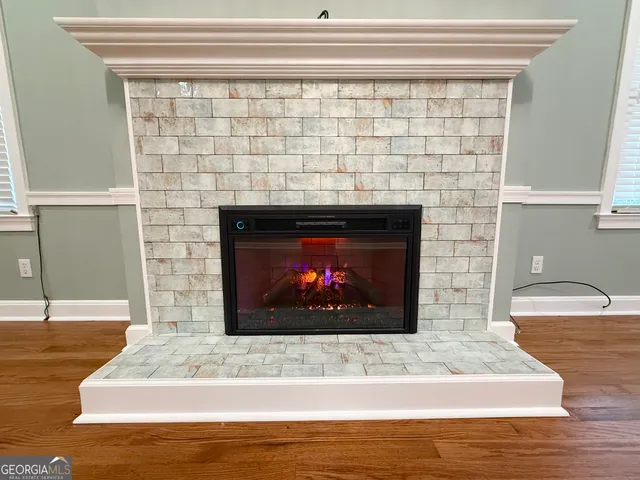 a view of entryway with hall way with furniture