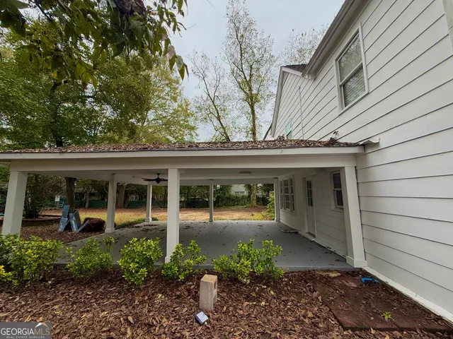 a view of a yard with a trees