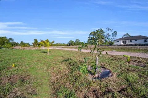 a view of a lake with a big yard