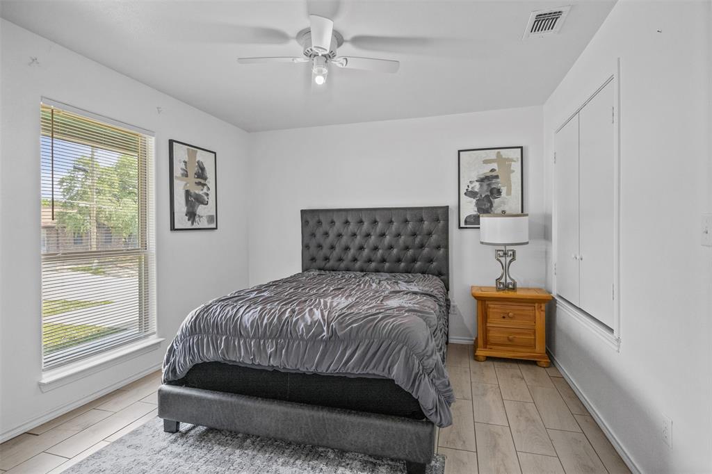 1816 Hidden Valley Road Granbury, TX 76049 - Photo 16 of 23 a bedroom with a bed and a window