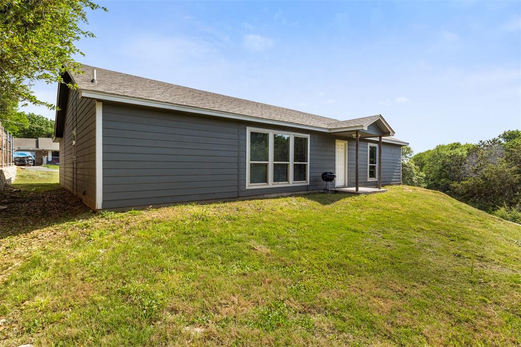 1816 Hidden Valley Road Granbury, TX 76049 - Photo 17 of 23 a house with a outdoor space