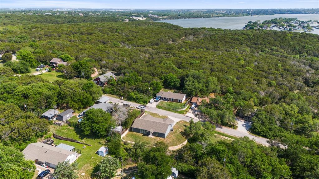 1816 Hidden Valley Road Granbury, TX 76049 - Photo 19 of 23 an aerial view of a houses with a yard