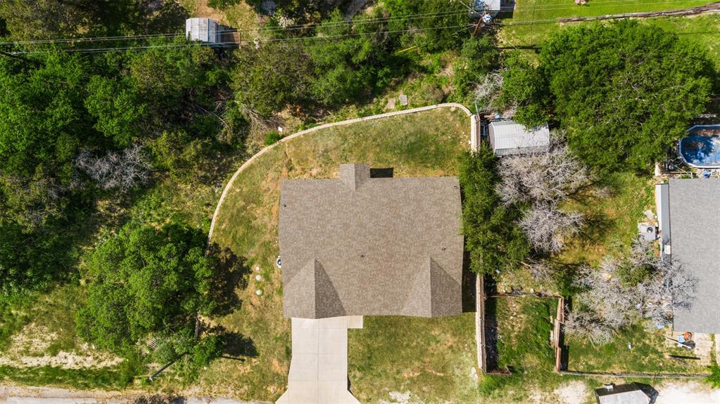 1816 Hidden Valley Road Granbury, TX 76049 - Photo 22 of 23 an aerial view of a house with a yard