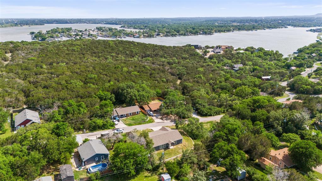 1816 Hidden Valley Road Granbury, TX 76049 - Photo 4 of 23 an aerial view of houses with yard
