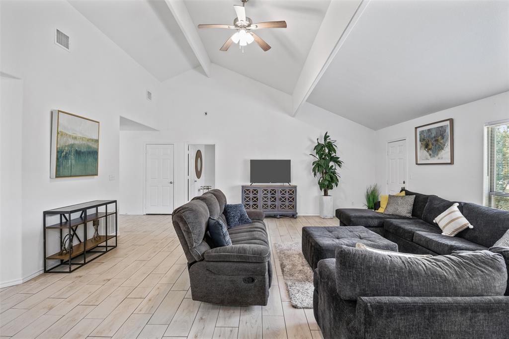 1816 Hidden Valley Road Granbury, TX 76049 - Photo 10 of 23 a living room with furniture and a wooden floor