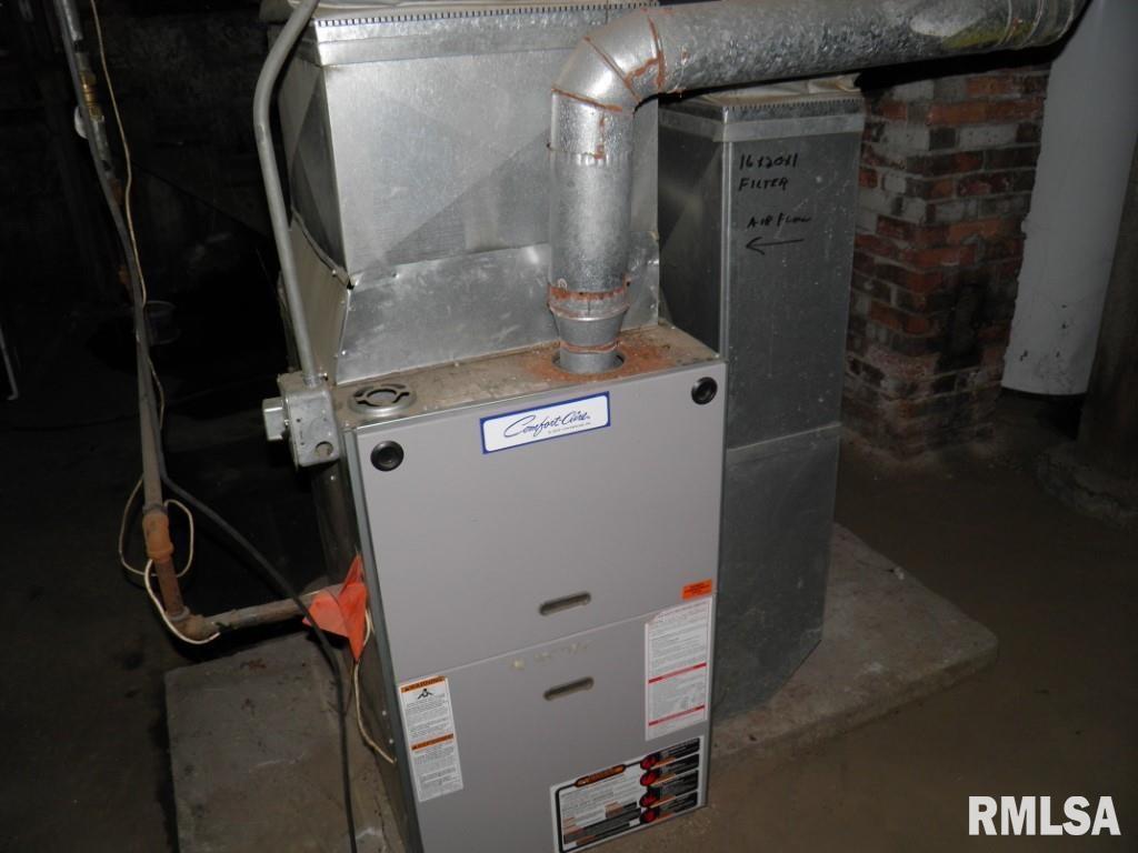 250 44th Street Moline, IL 61265 - Photo 12 of 19 a close view of water heater room