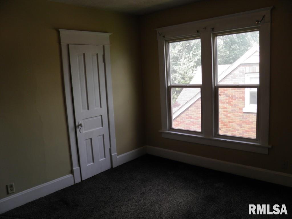 250 44th Street Moline, IL 61265 - Photo 17 of 19 an empty room with a window
