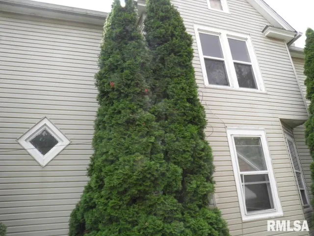 a view of a house with a garage