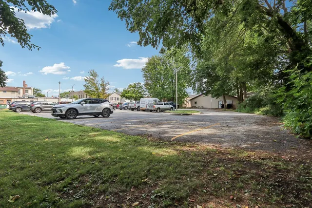 a cars parked in the middle of a yard