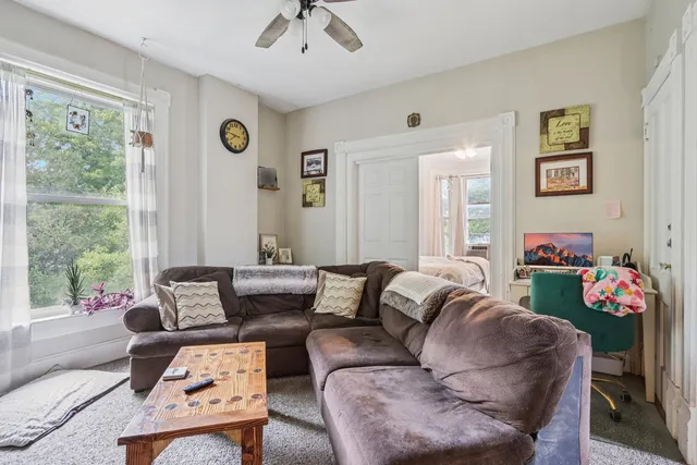 a living room with furniture and a couch