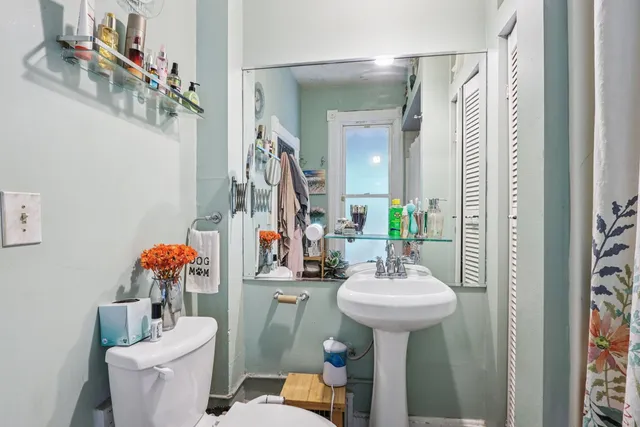 a kitchen with granite countertop a sink and a window