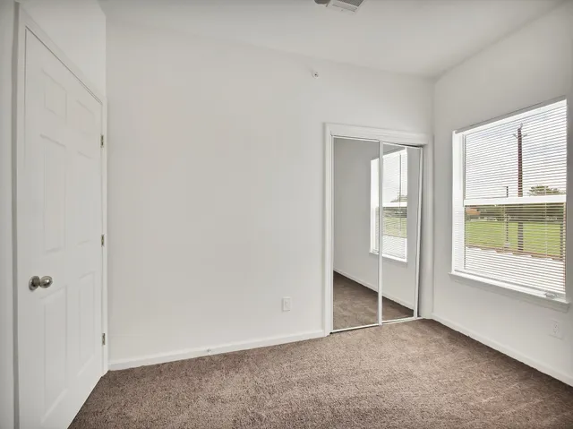 an empty room with windows