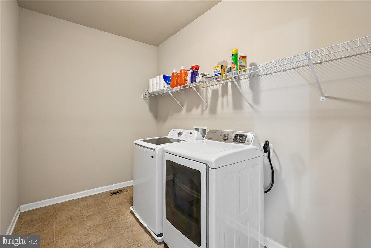 12268 Sedge Street Bristow, VA 20136 - Photo 24 of 48 a utility room with dryer and washer
