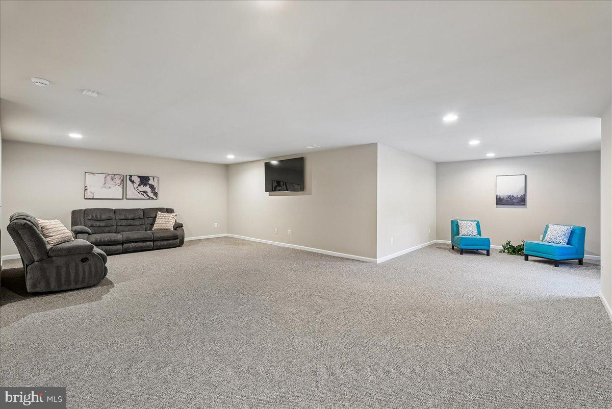12268 Sedge Street Bristow, VA 20136 - Photo 26 of 48 a living room with furniture and a couch