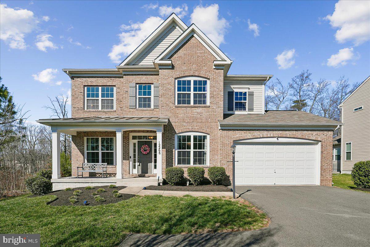 12268 Sedge Street Bristow, VA 20136 - Photo 45 of 48 front view of a house with a yard