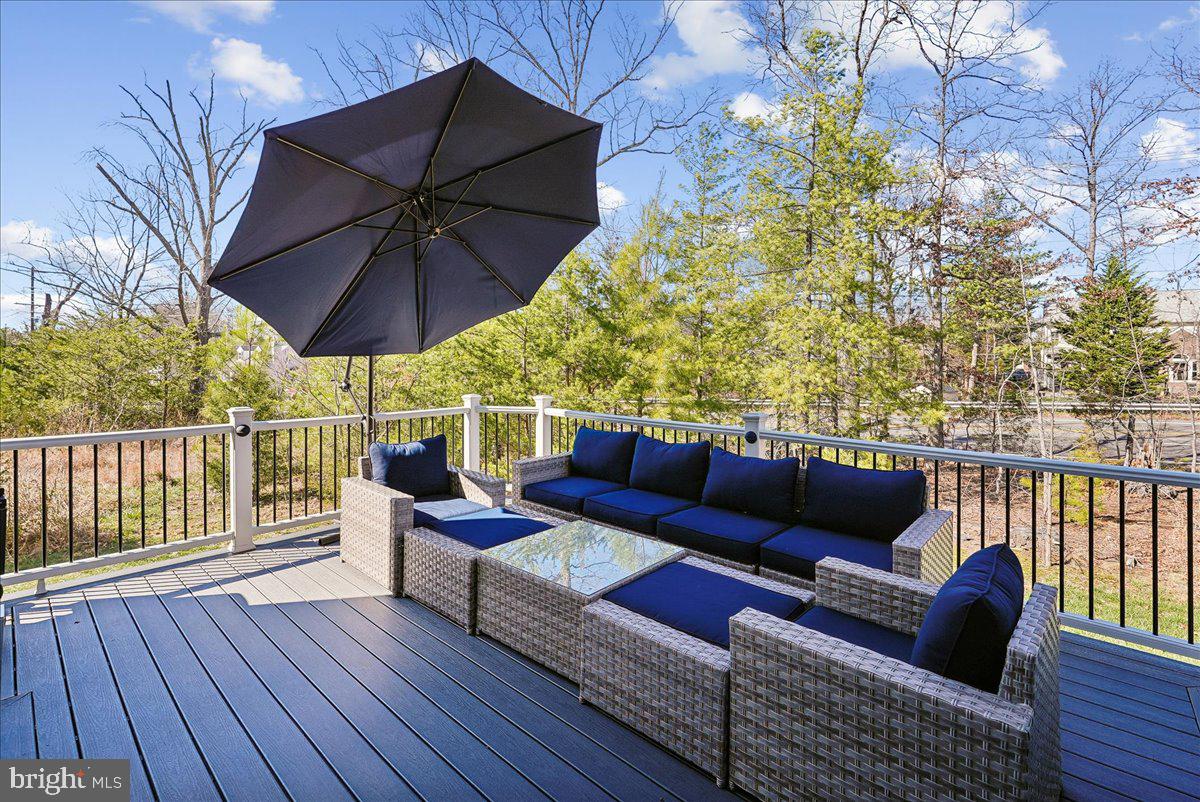 12268 Sedge Street Bristow, VA 20136 - Photo 4 of 48 a view of a roof deck with furniture