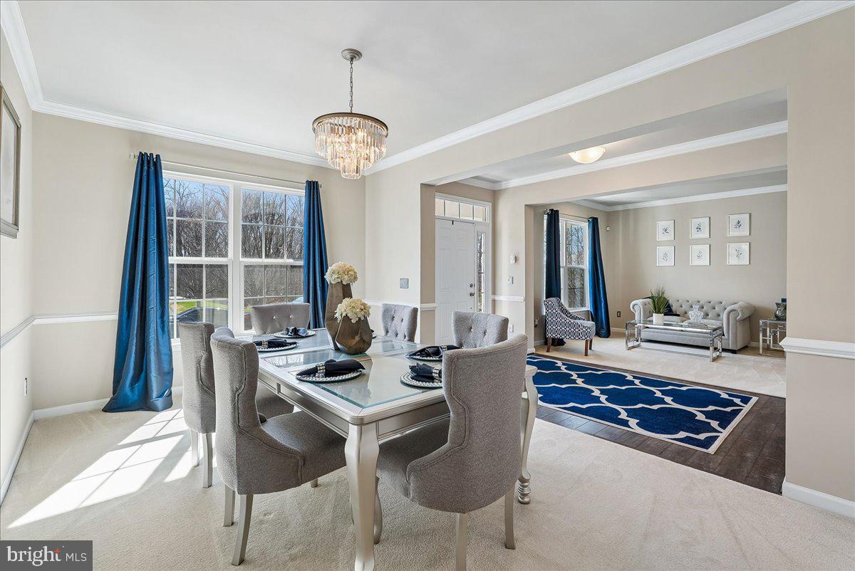 12268 Sedge Street Bristow, VA 20136 - Photo 7 of 48 a living room with furniture and a large window