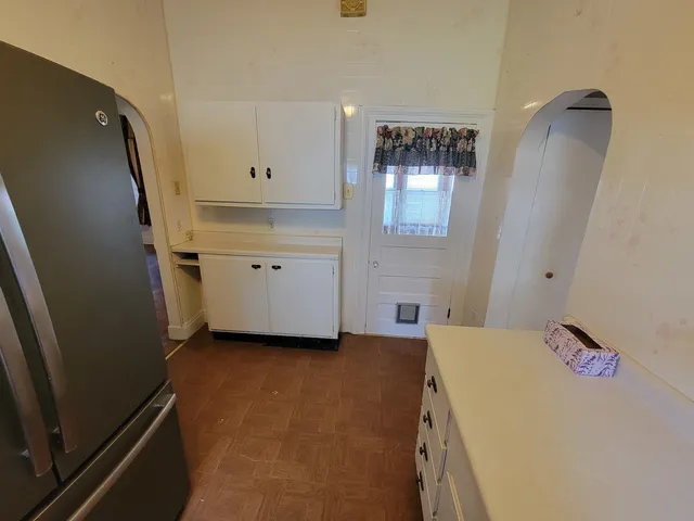 a view of a kitchen with a sink