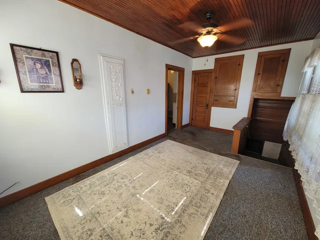 a view of a hallway with a workspace