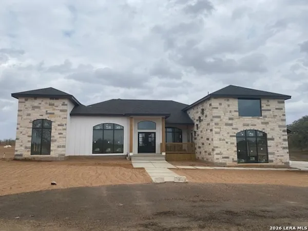 front view of a house with a street