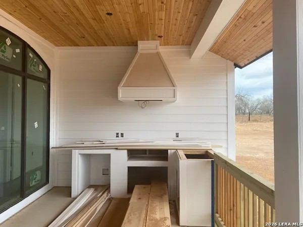 a view of a kitchen with a sink and dishwasher