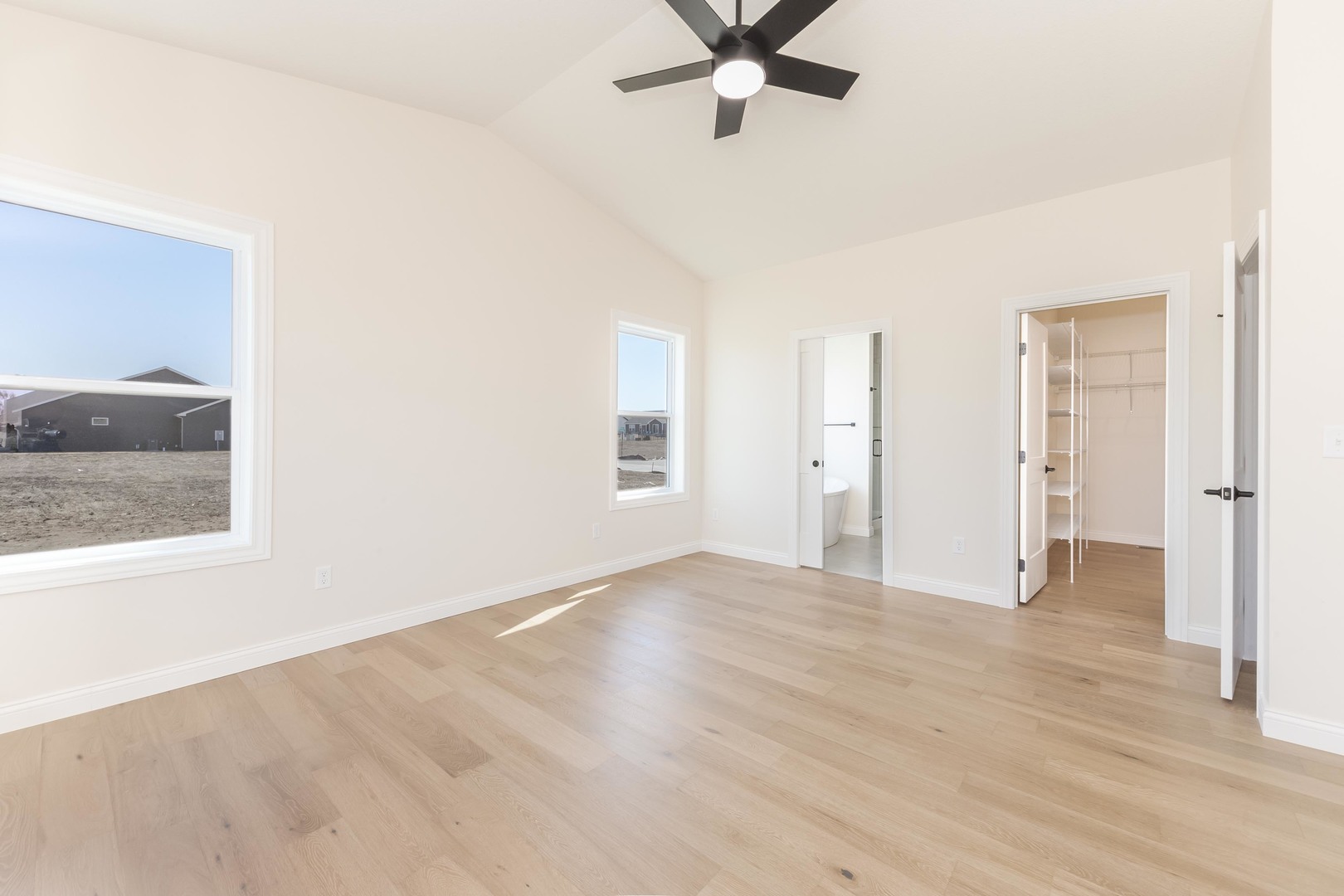 2538 Marble Road Normal, IL 61761 - Photo 16 of 27 a view of a livingroom with a window and wooden floor