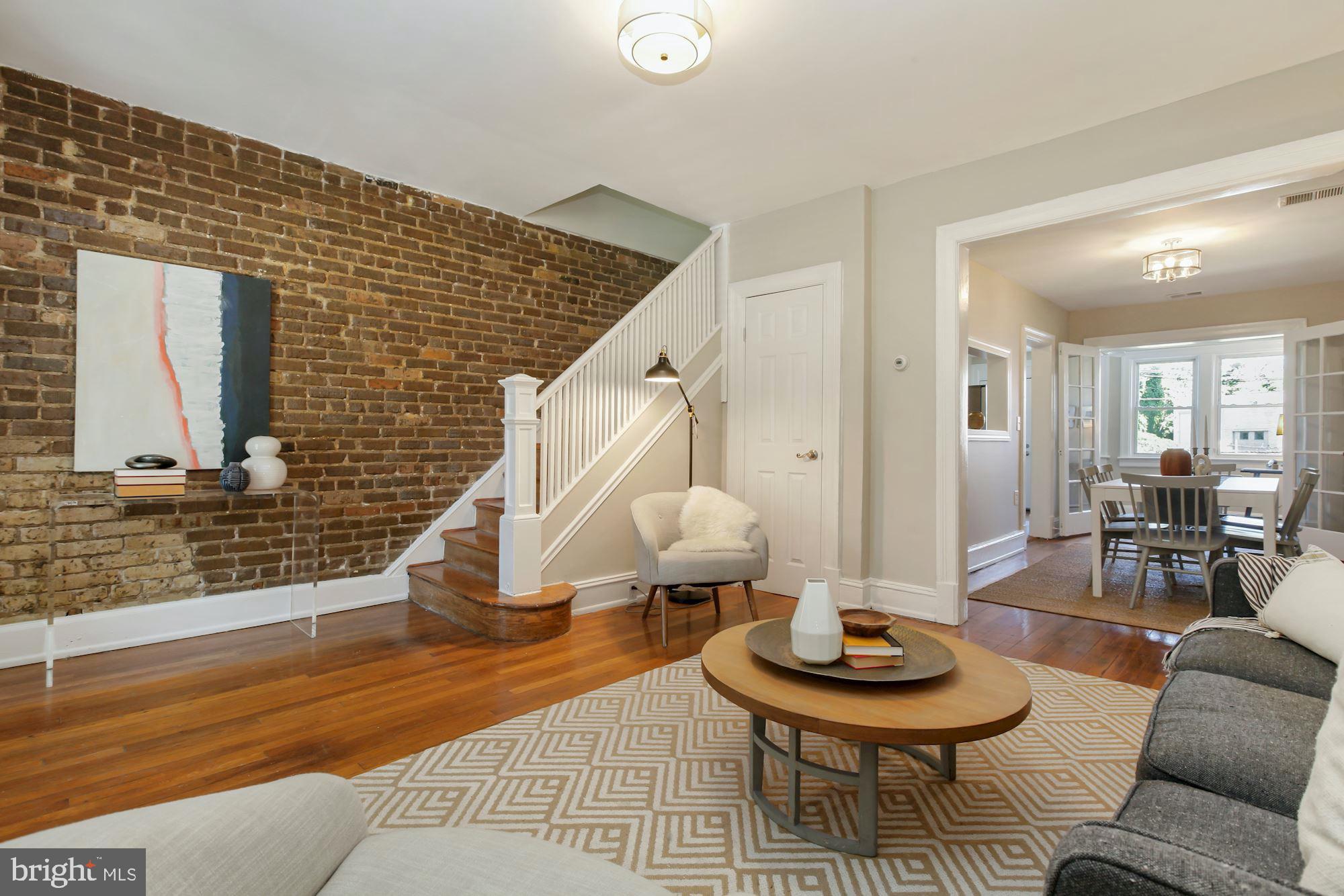 1328 Ridge Place Southeast Washington, DC 20020 - Photo 4 of 28 Exposed brick Living room