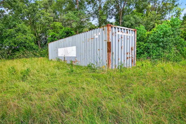 a view of a garden with a fountain