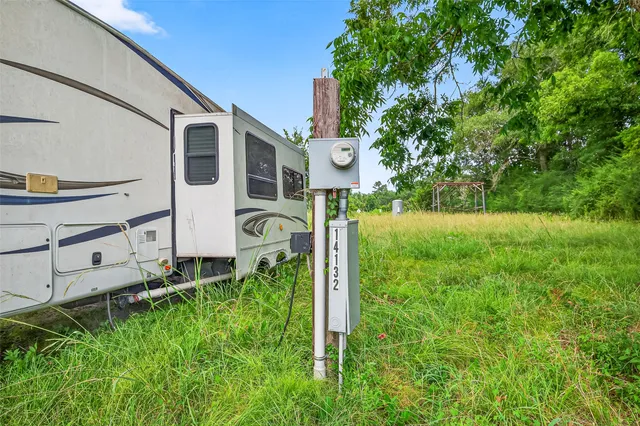 a backyard of a house with lots of green space and garden view