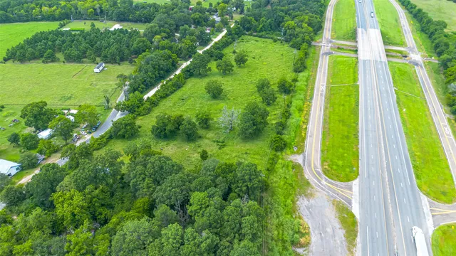 a view of a garden from a balcony