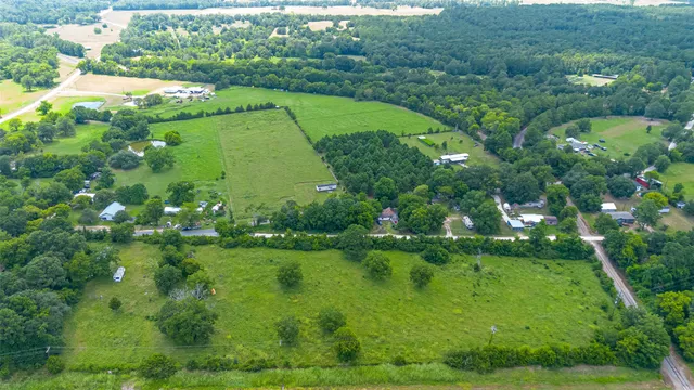 a view of a garden with a fountain