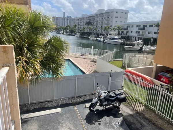 a terrace with outdoor seating and city view