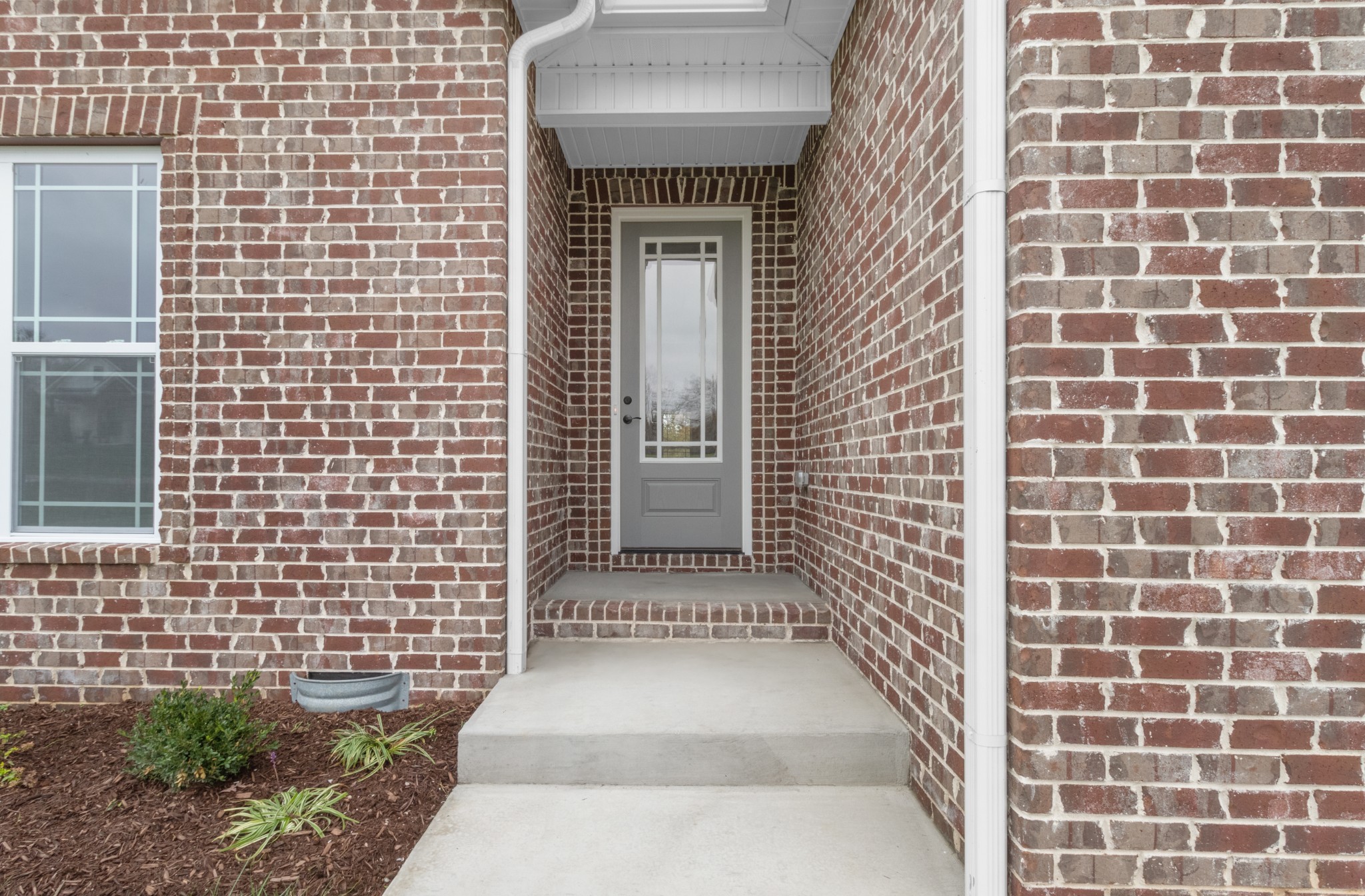 282 Martha Morgan Way Cunningham, TN 37052 - Photo 2 of 36 a view of a brick wall