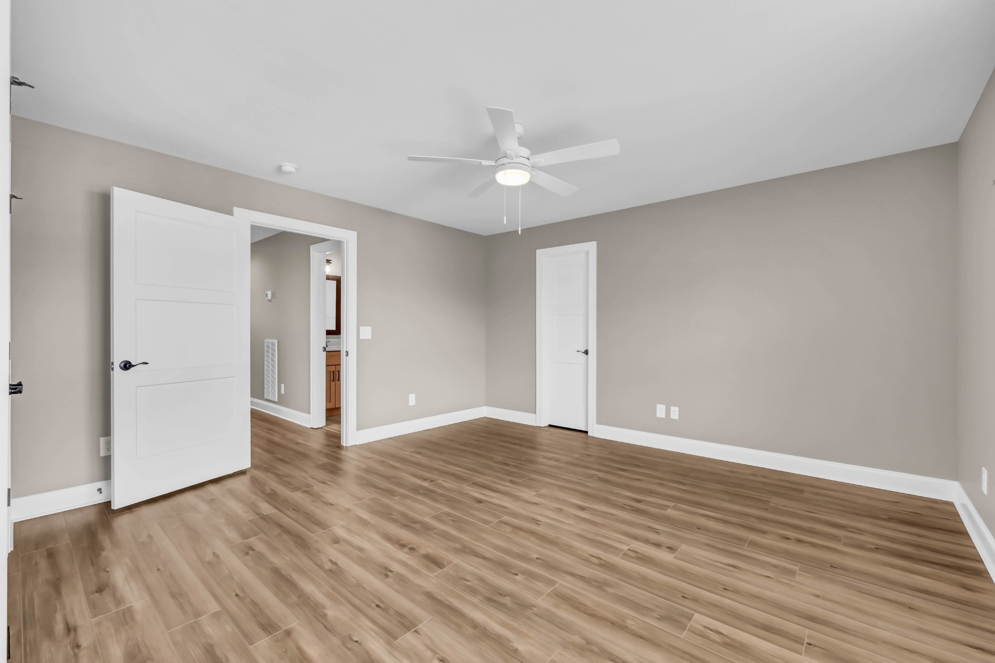 282 Martha Morgan Way Cunningham, TN 37052 - Photo 31 of 36 a view of an empty room with wooden floor
