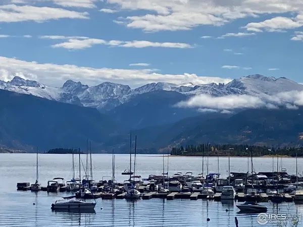 a bathroom with a toilet sink and shower