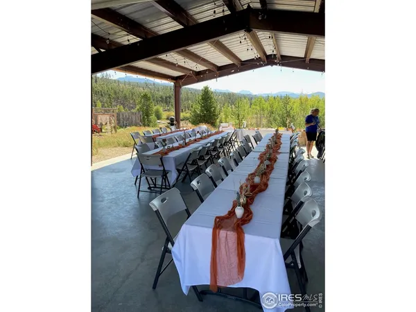 a bed room with a bed and a large window