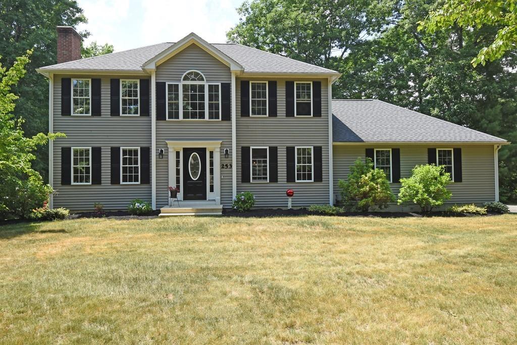 253 Pommogussett Road Rutland, MA 01543 - Photo 1 of 25 a front view of a house with a yard