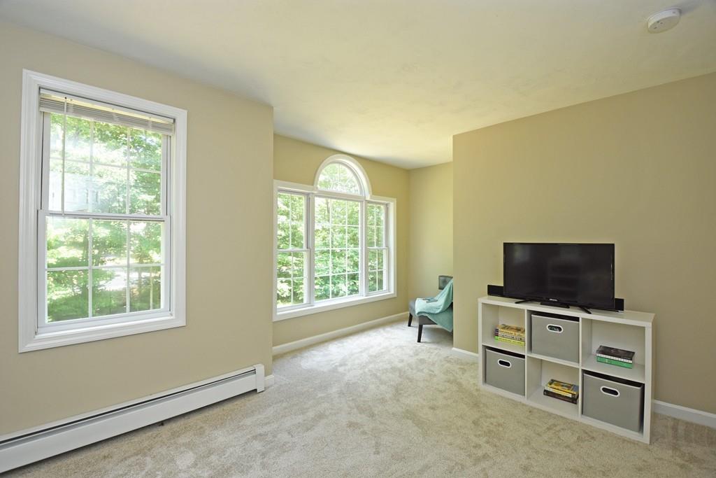 253 Pommogussett Road Rutland, MA 01543 - Photo 15 of 25 a view of a livingroom with furniture and a flat screen tv