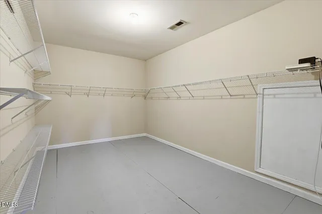 a view of a room with racks on the wall