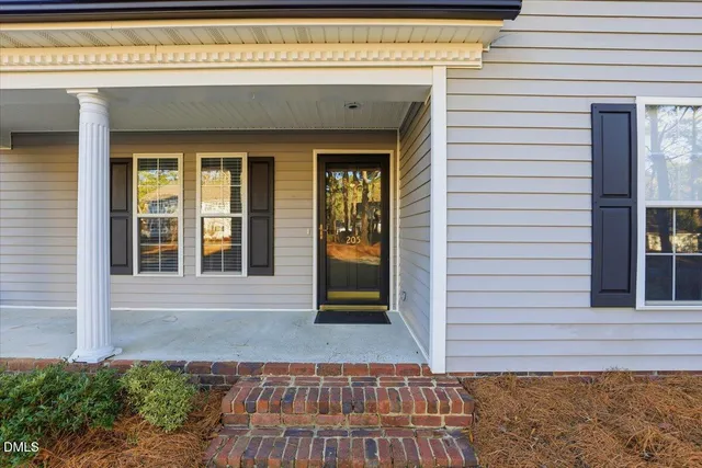 a front view of a house with a window