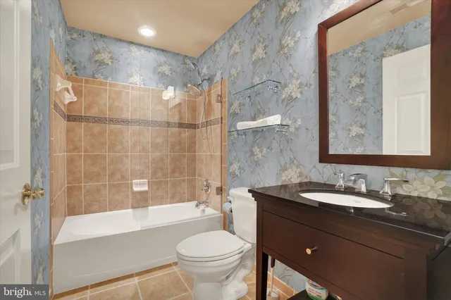 a view of a room with furniture and gym equipment