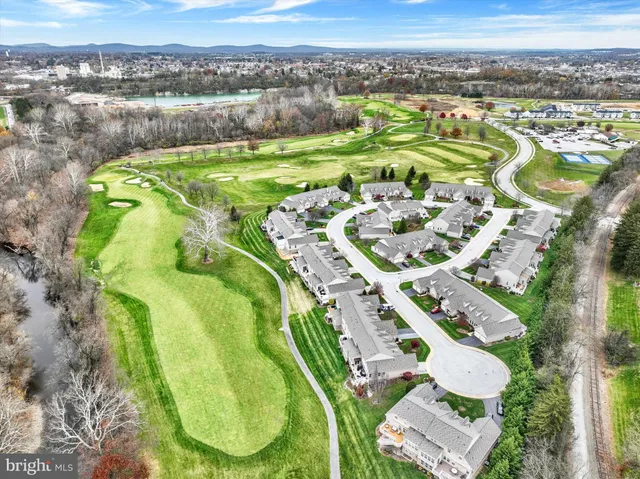 a view of a swimming pool with a balcony